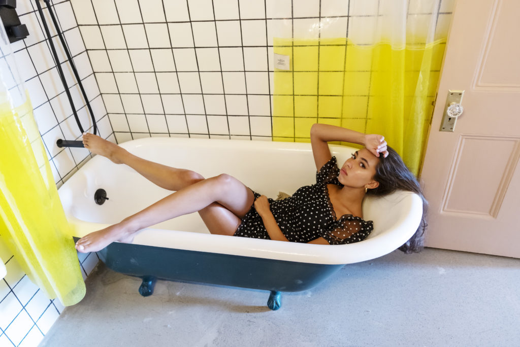 photo of jaden in bathtub in polka dot dress